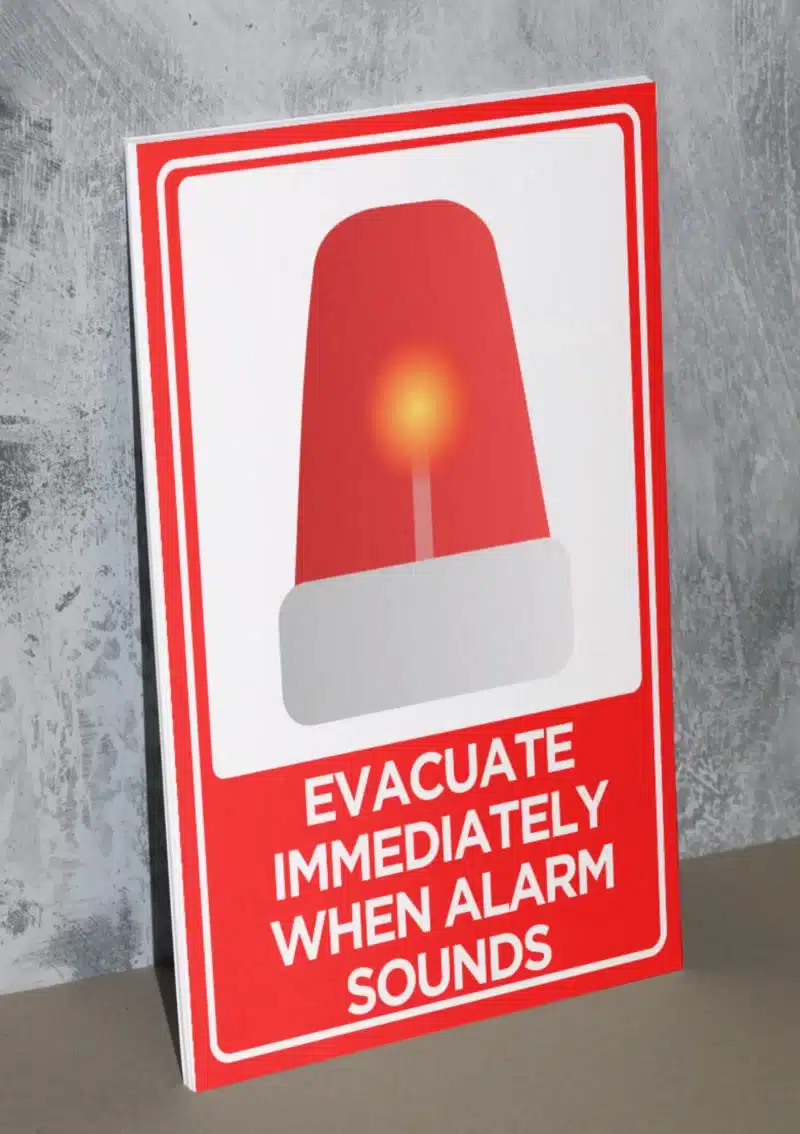 "Evacuate Immediately When Alarm Sounds" - Foam board school sign , 12 by 17 inches