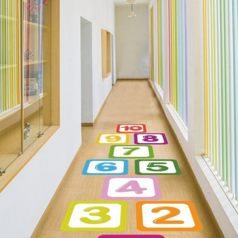 "1-10 colorful Numbers inside a square shapes Hopscotch jumping game " - " "Available in sticker and Flex" ACTIVITY GAME
